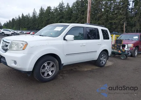 2010 Honda Pilot Touring z USA, uszkodzony, nr VIN 5FNYF4H92AB031653